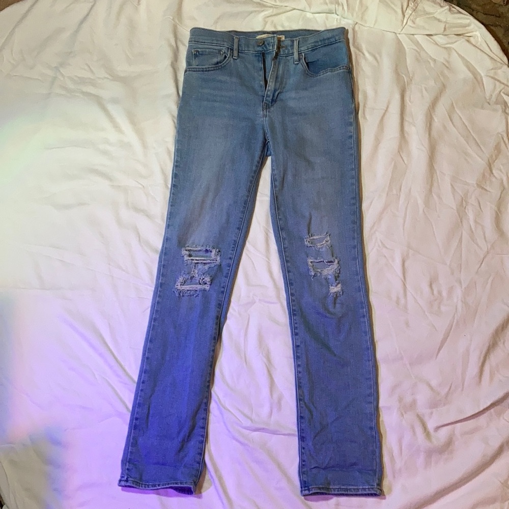 Levi blue denim jeans size 27 - high rise straights